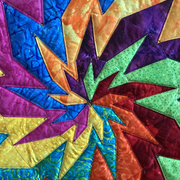 Photo of a colorful quilt square.