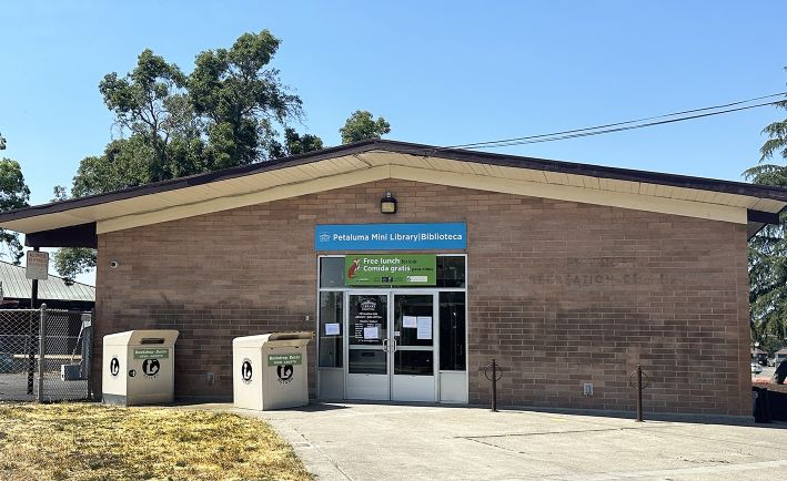 Photo of Petaluma Mini library showing book drops and front doors 