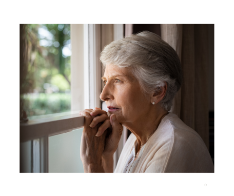 Older women looking out of a window