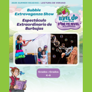 Photo of the Bubble Lady putting 3 children in a giant bubble.