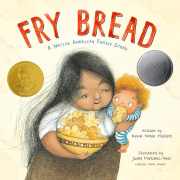 Cover of Kevin's book Fry Bread featuring a grandmother holding her grandchild eating fry bread.