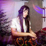 Photo of DJ Yuka Yu DJing