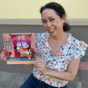 Photo of author Kiyoko Nakano posing with her book.