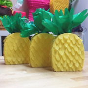 Photo of mini pineapple pinatas.